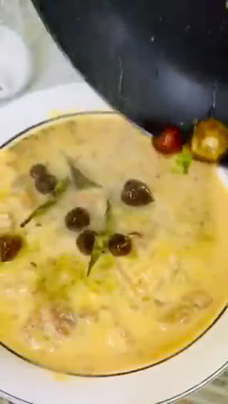 A picture of step 12 of Pakoray ki curry.