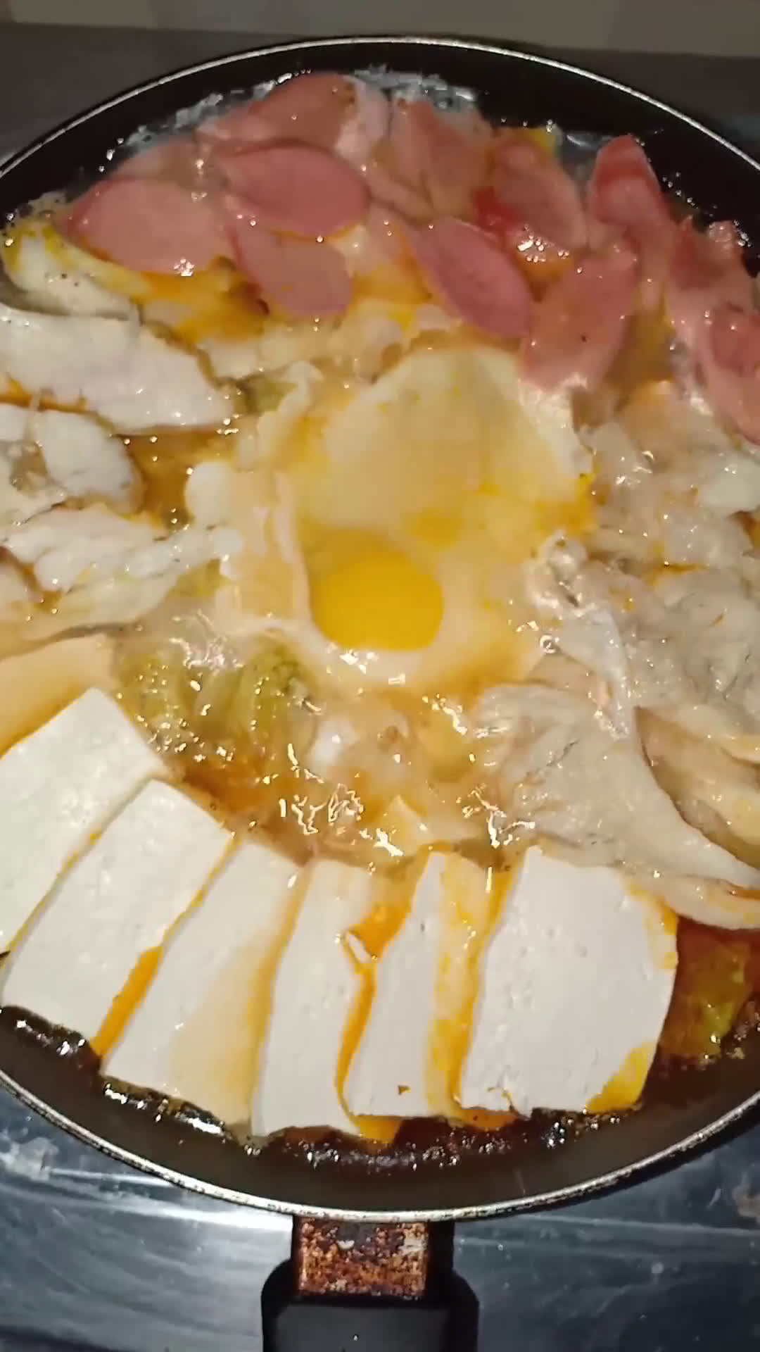 Foto langkah ke 5 dari resep Sundubu Jjigae (Sup Tahu Pedas).