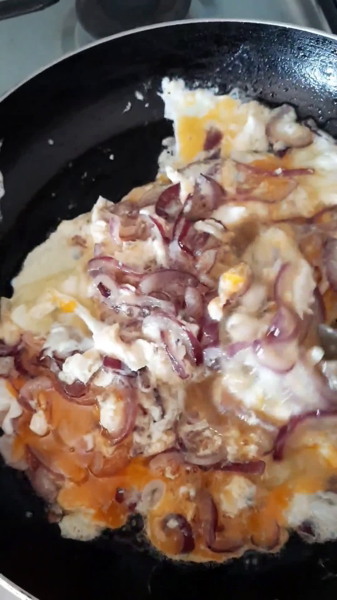 A picture of step 2 of Oniony eggs.