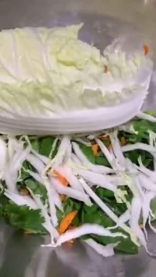 A picture of step 4 of Vietnamese cabbage salad with tofu, rice vermicelli and peanuts.