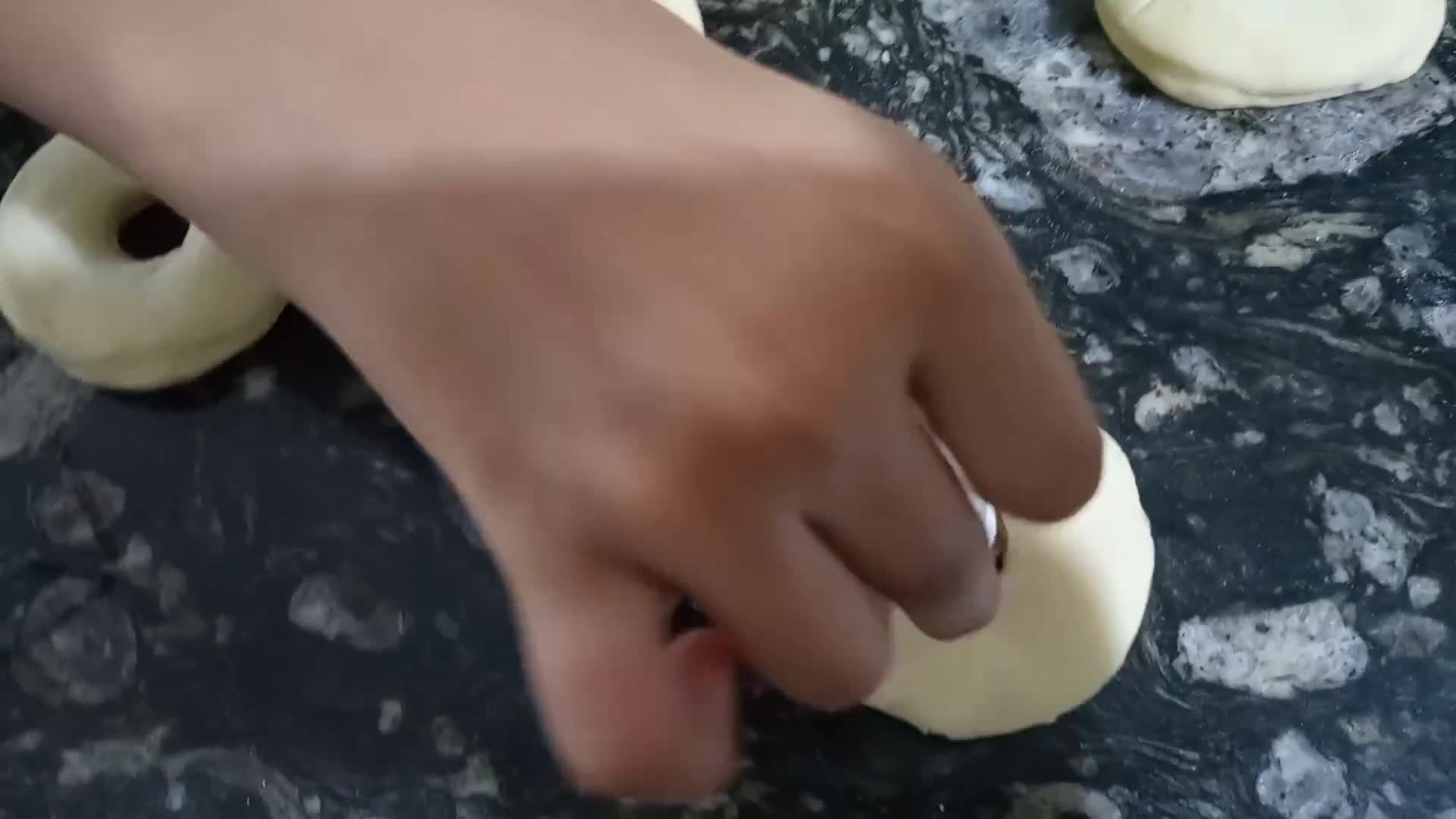 A picture of step 3 of Doughnuts.