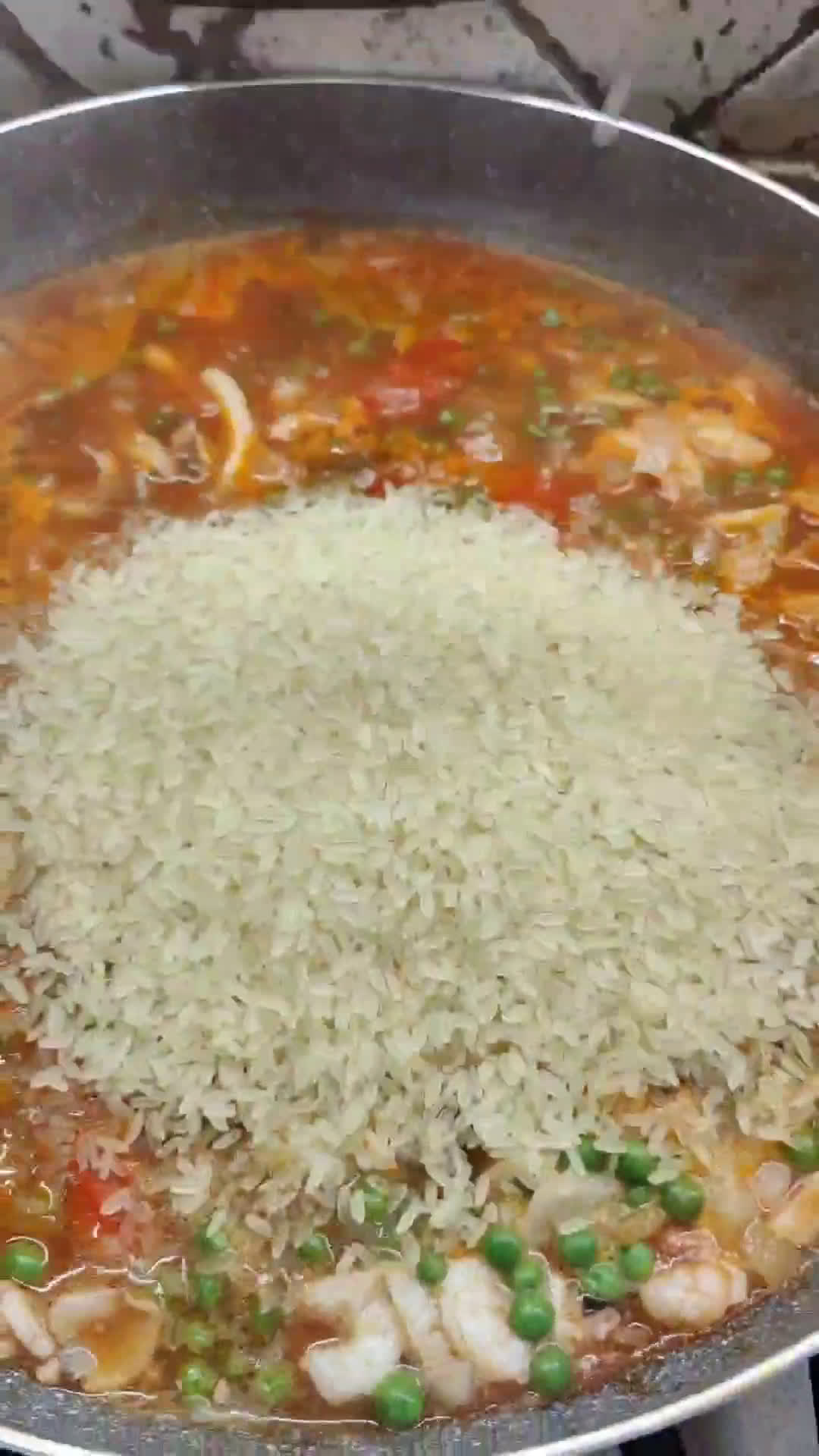 Foto del passaggio 7 della ricetta Paella di pesce