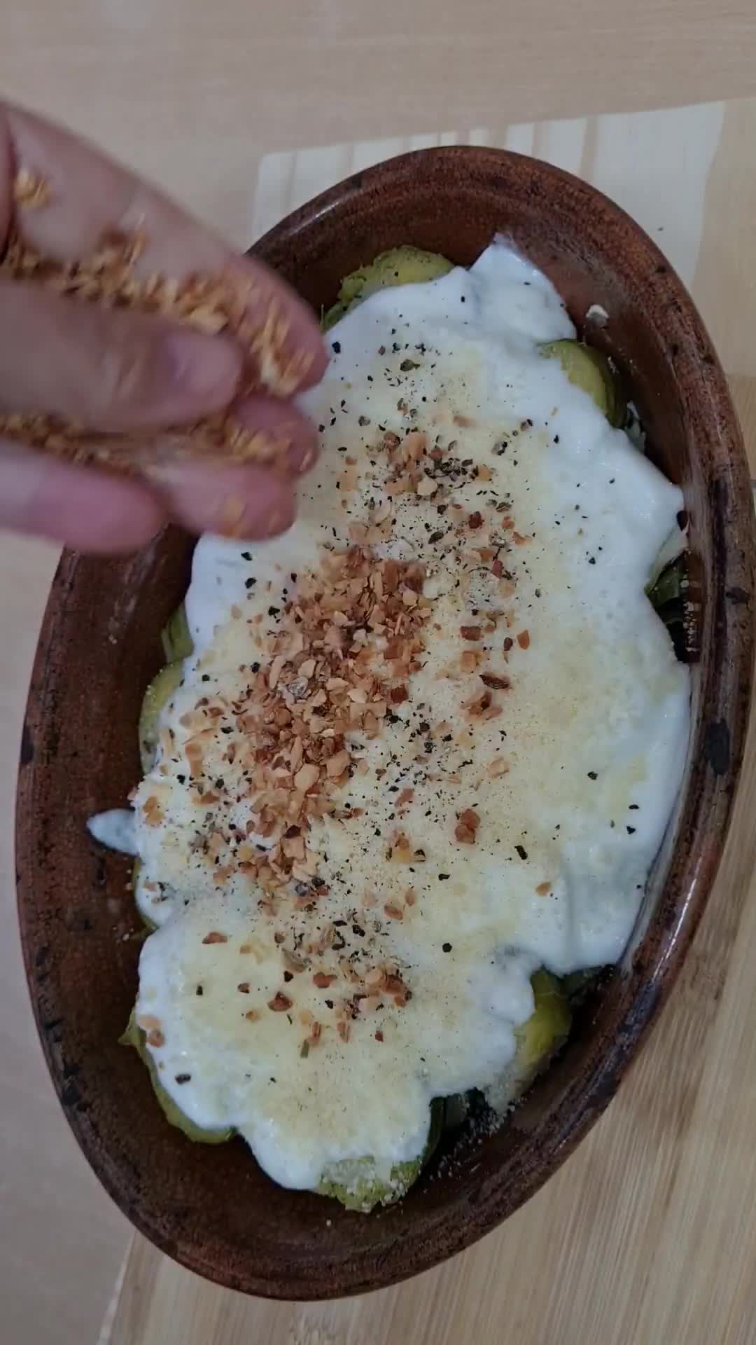 Foto del paso 3 de la receta: Repollitos de Bruselas en yogur, sobre base de avena y gratinados con queso