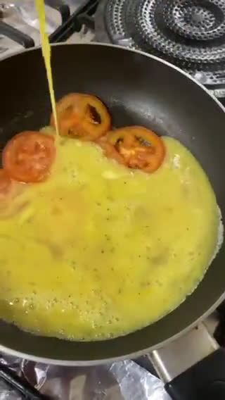 صورة لخطوة 3 من وصفة بيض بالطماطم