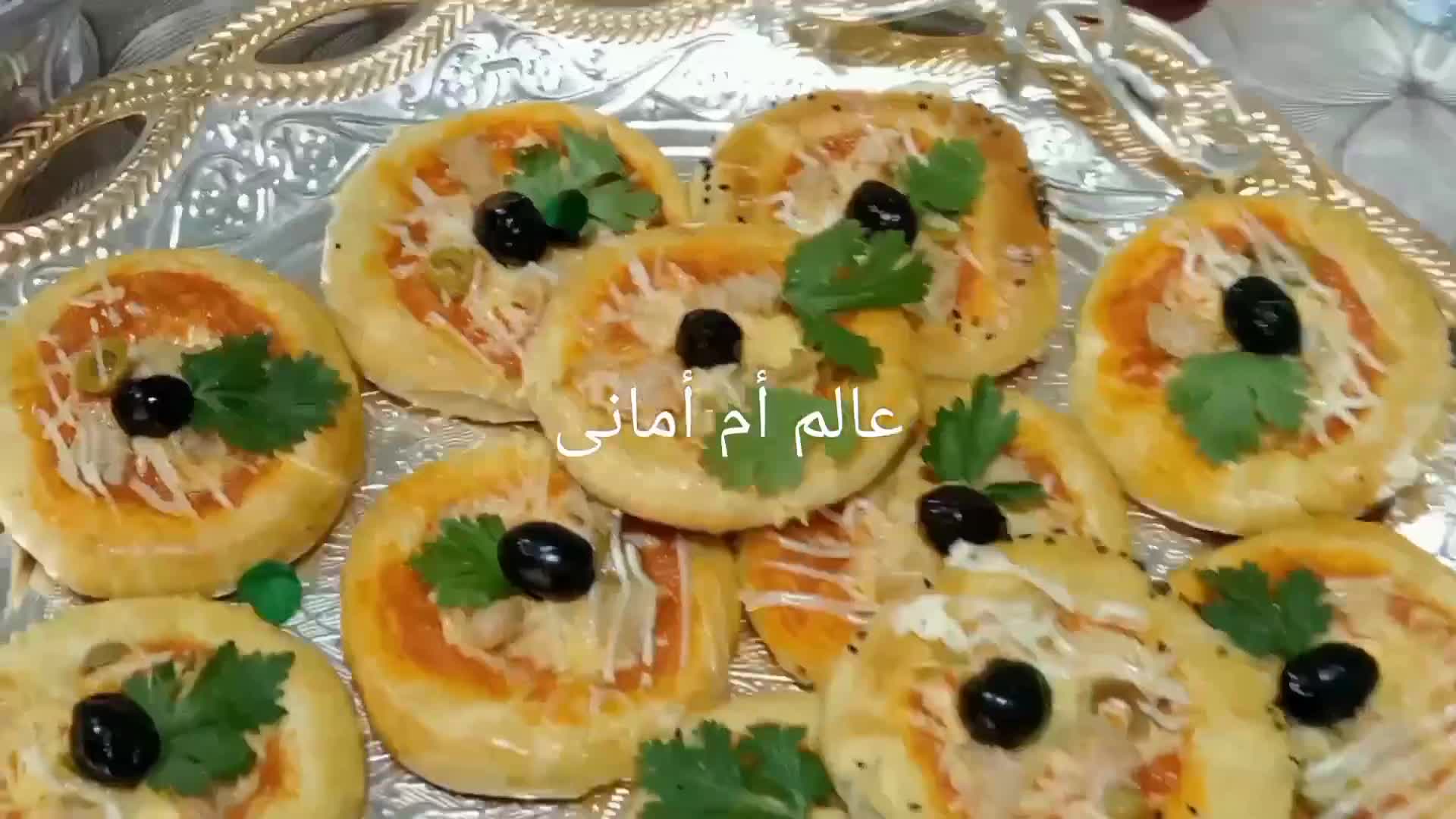 صورة لخطوة 10 من وصفة ميني بيتزا لمناسباتكم