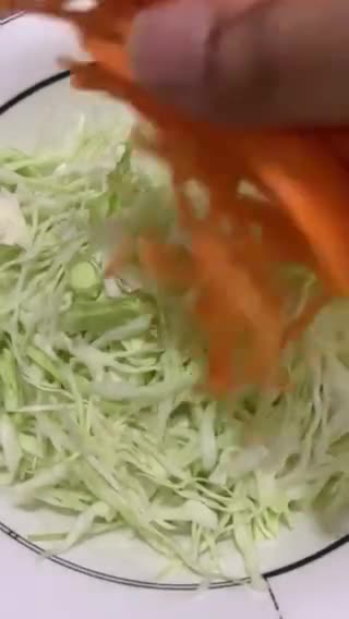 A picture of step 1 of Coleslaw with raisins.