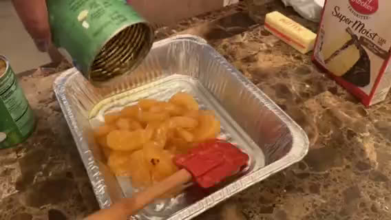 A picture of step 1 of Apple dump cake.