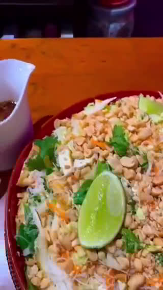 A picture of step 5 of Vietnamese cabbage salad with tofu, rice vermicelli and peanuts.