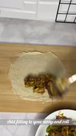 A picture of step 11 of Chicken vegetable spring rolls.