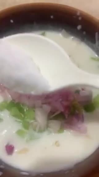 A picture of step 2 of Cucumber Raita.