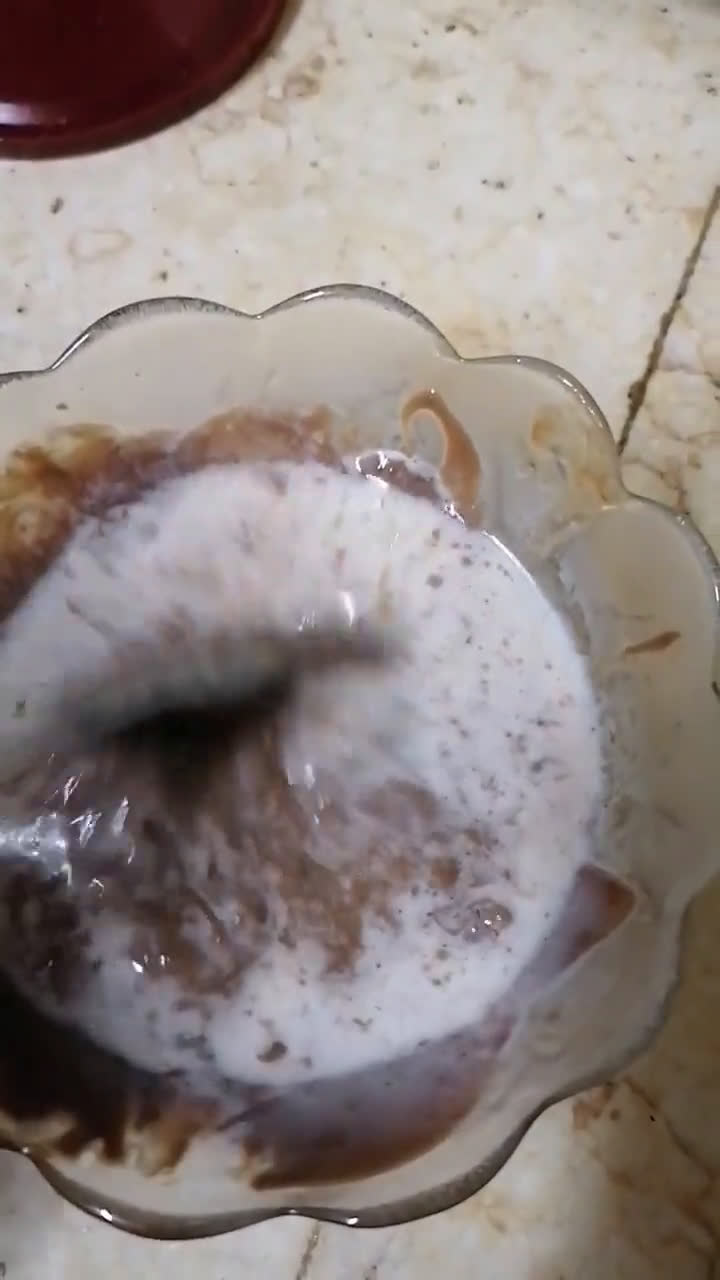A picture of step 2 of Chocolate bread pudding with custard sauce.
