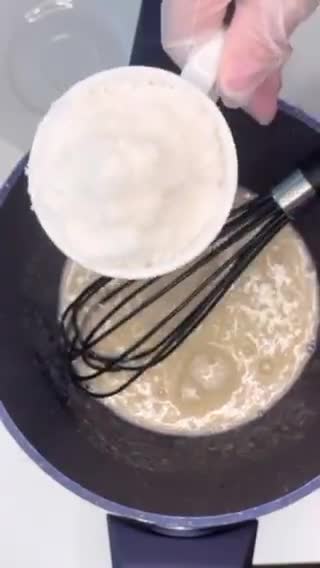 صورة لخطوة 2 من وصفة اقراص جوز الهند 🥥