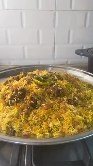 صورة لخطوة 10 من وصفة ارز بخاري باللحم