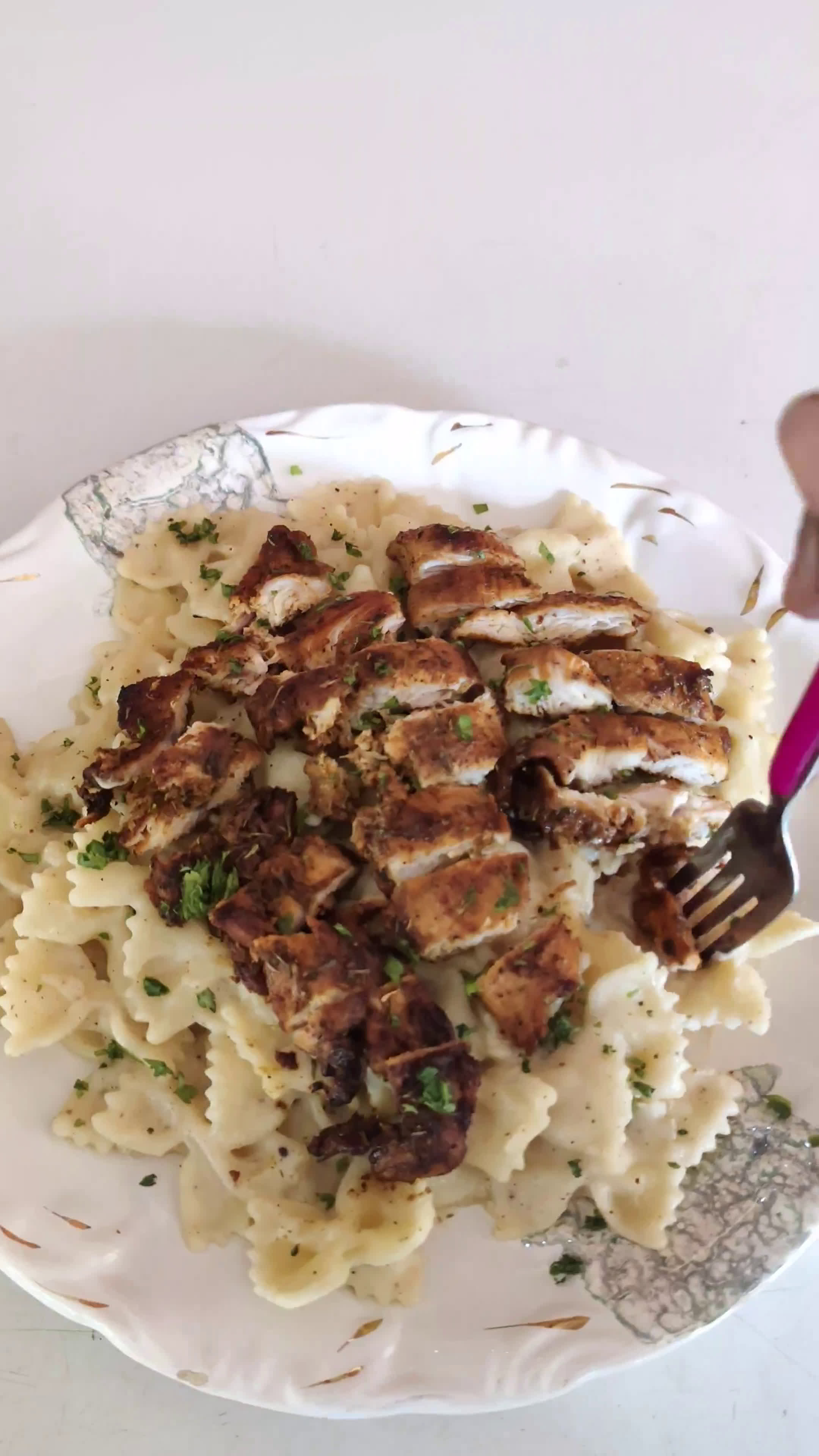 A picture of step 9 of Cajun Chicken and Farfalle Alfredo Pasta.