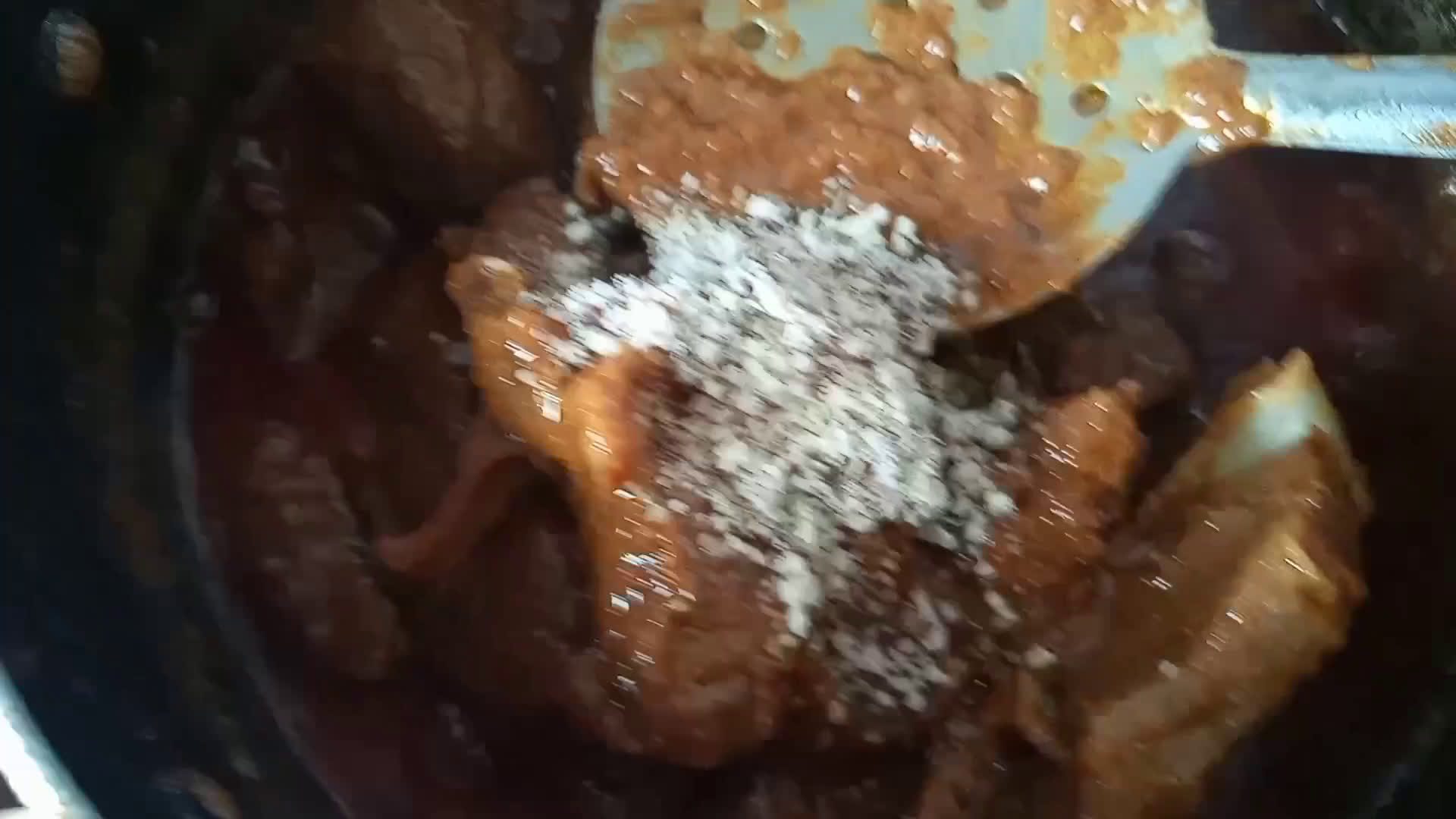 A picture of step 4 of Mutton Badami qorma.