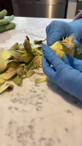 Foto del passaggio 3 della ricetta Carciofini sott’olio