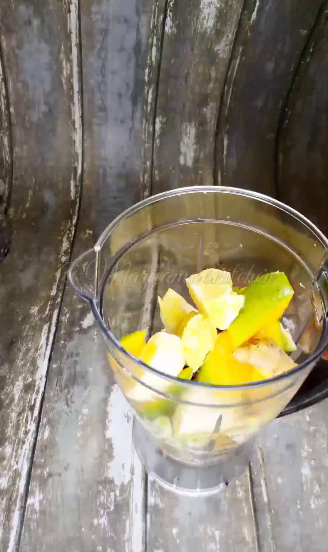 A picture of step 1 of Mango sangria.