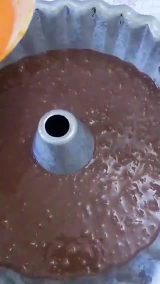 صورة لخطوة 4 من وصفة كيكة الكاكاو والبرتقال الاسفنجية 🤤😋