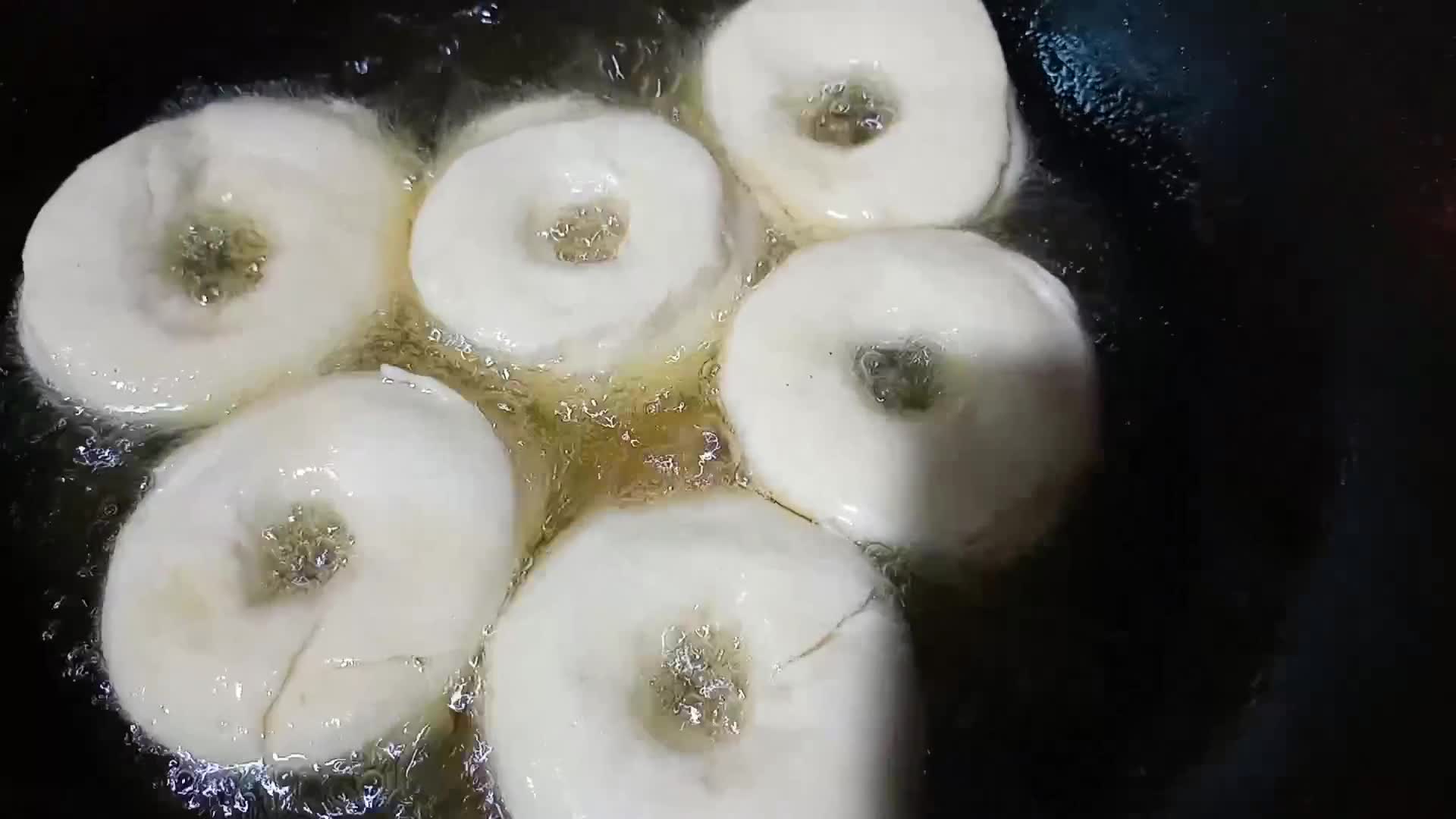 A picture of step 3 of Doughnuts.