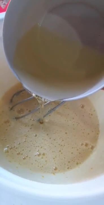 Foto del paso 1 de la receta: Budín tricolor de naranja, dulce de leche y cacao🧉