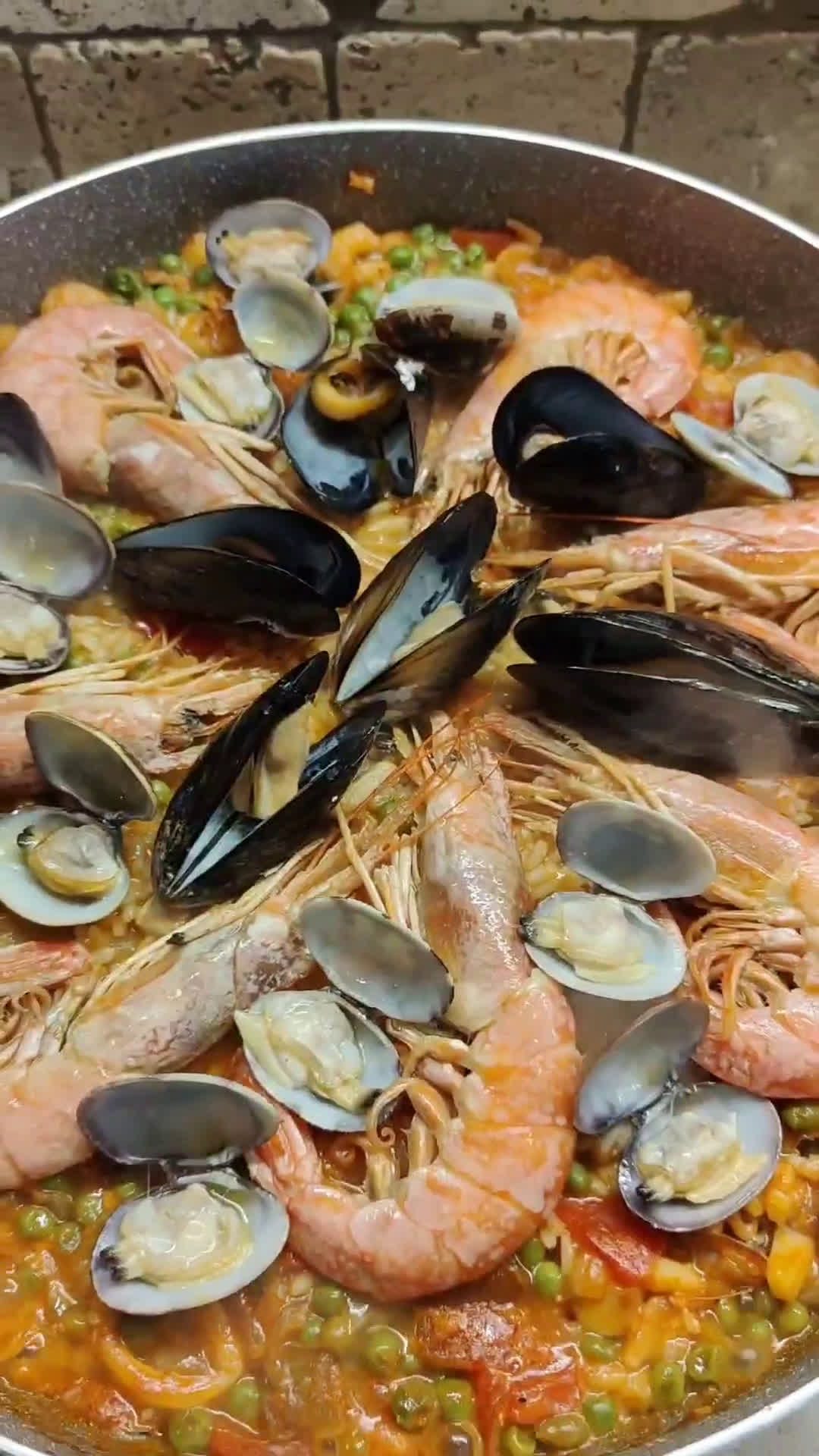 Foto del passaggio 8 della ricetta Paella di pesce