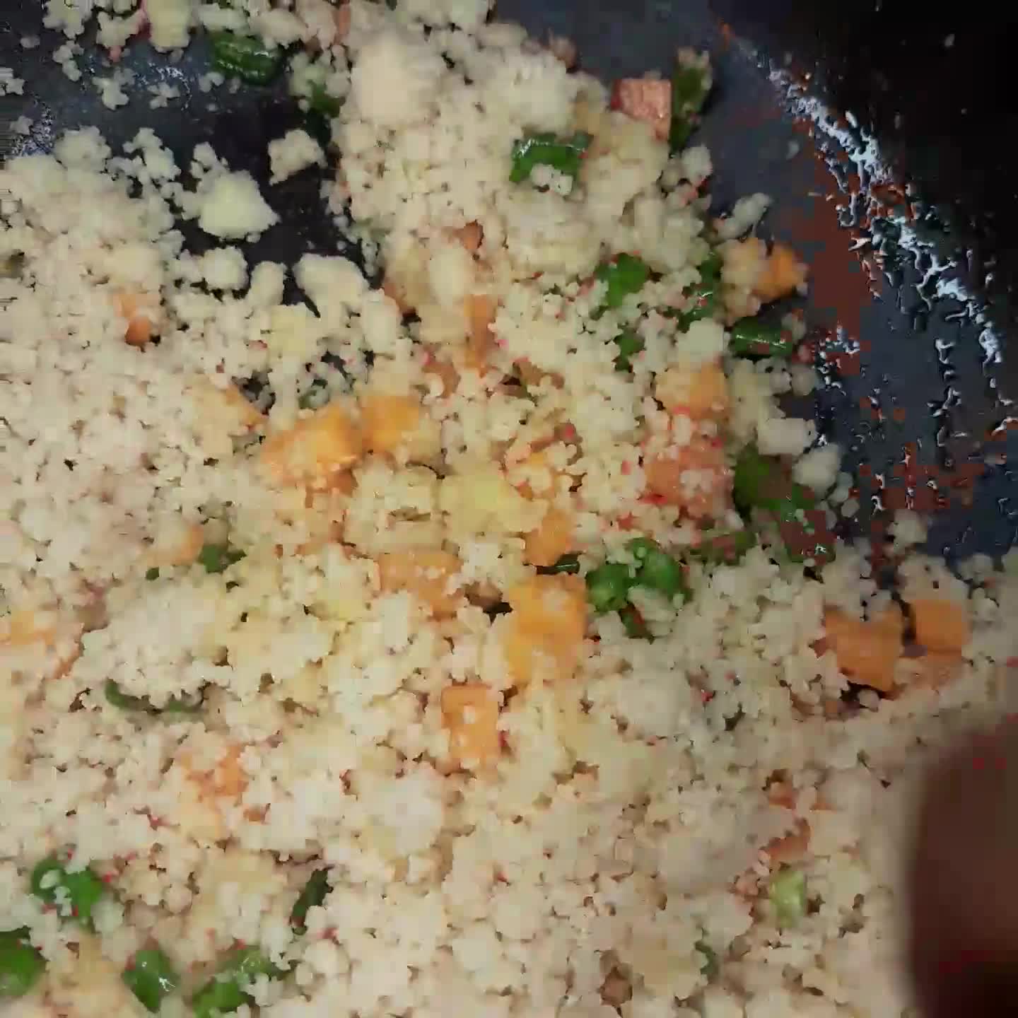 A picture of step 4 of Buttered couscous and onion sauce.
