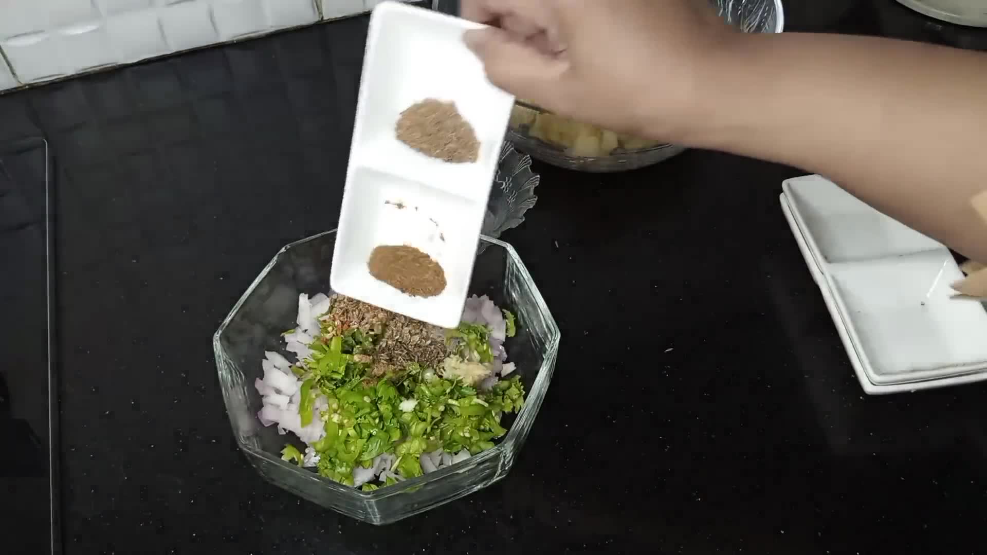 A picture of step 7 of Aloo Ke samosay.