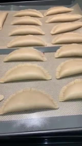 A picture of step 5 of Empanadas with Cola.