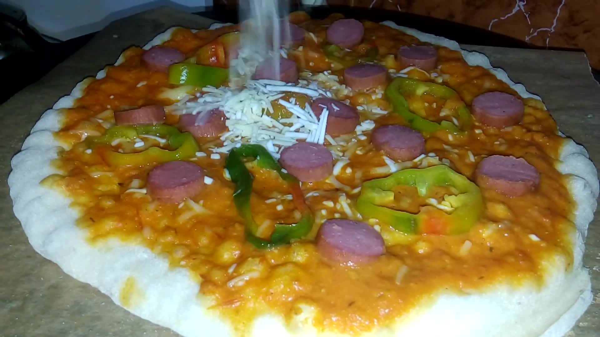 صورة لخطوة 10 من وصفة البيتزا 🍕
